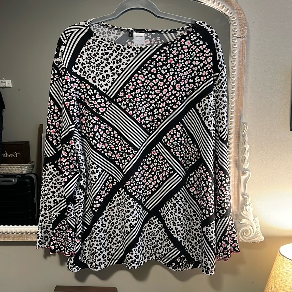 Pins and Needles. Black and white leopard print